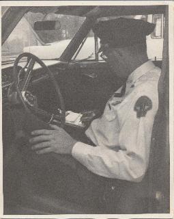 Officer in cruiser